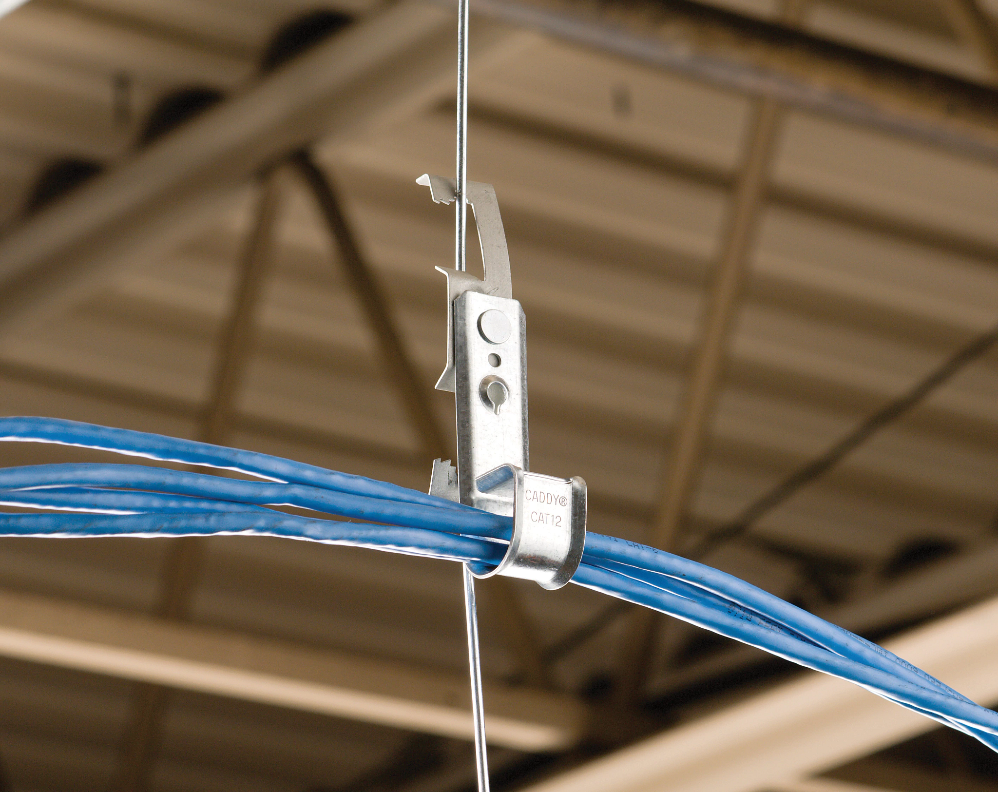 Image of COMM CBL HANGER in use.