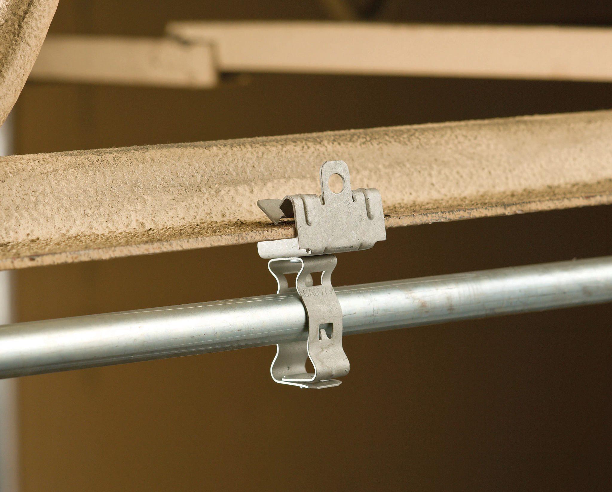 Image of 1-IN COND HGR&CLAMP CONDUIT HANGER in use.