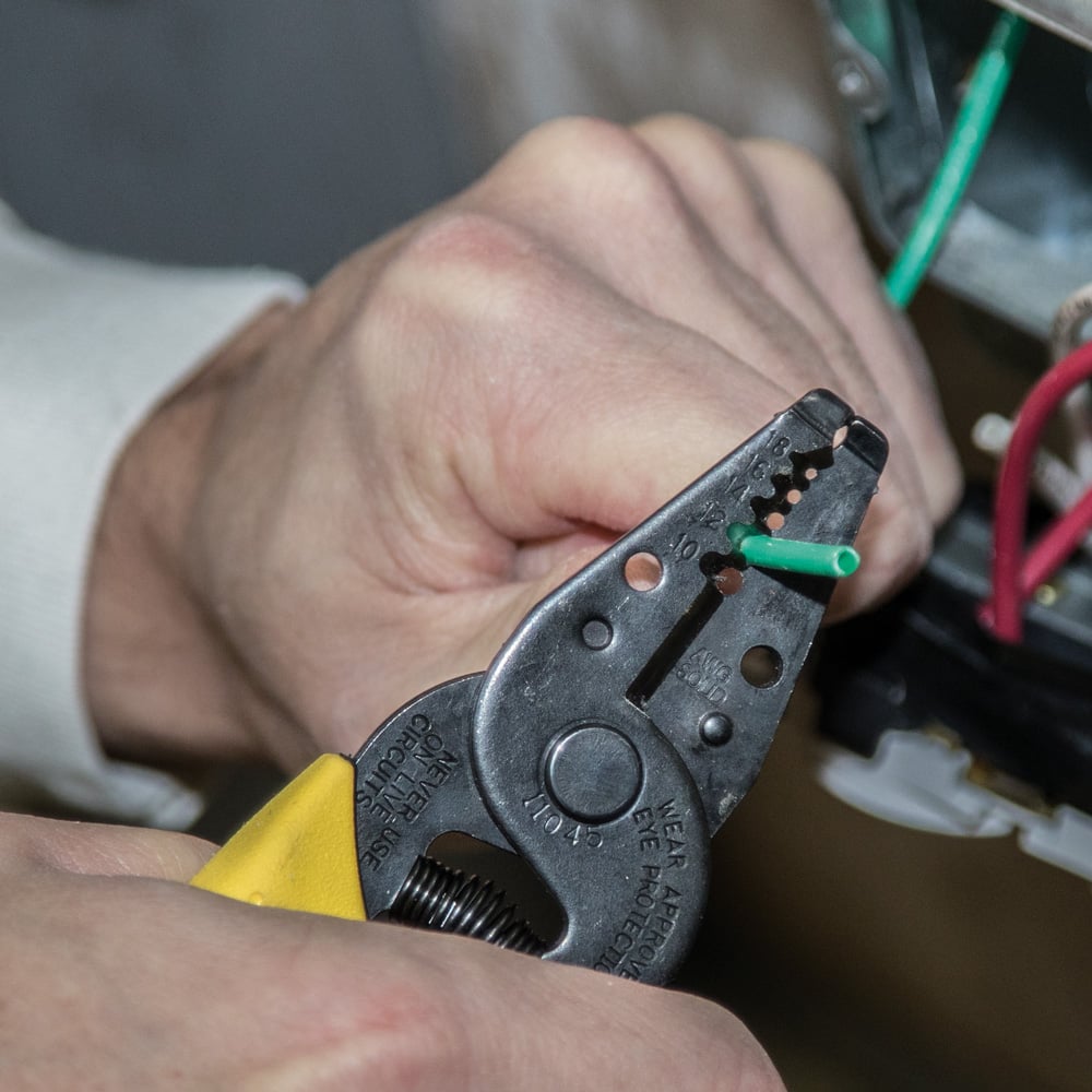Image of WIRE STRIPPER in use.