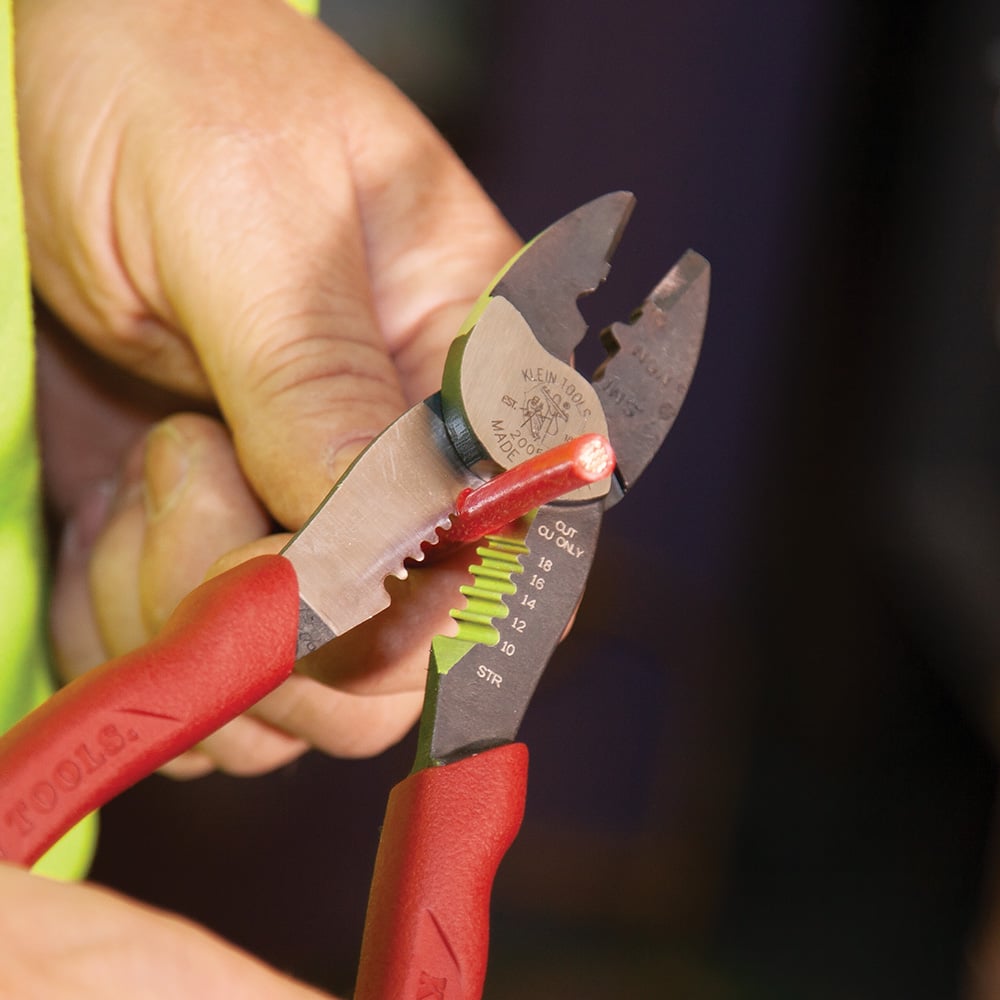 Image of CRIMPING TOOL (INSULATED AND NON) WITH STRIPPING in use.