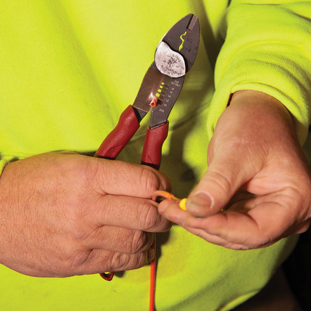 Alternate image of CRIMPING TOOL (INSULATED AND NON) WITH STRIPPING in use.