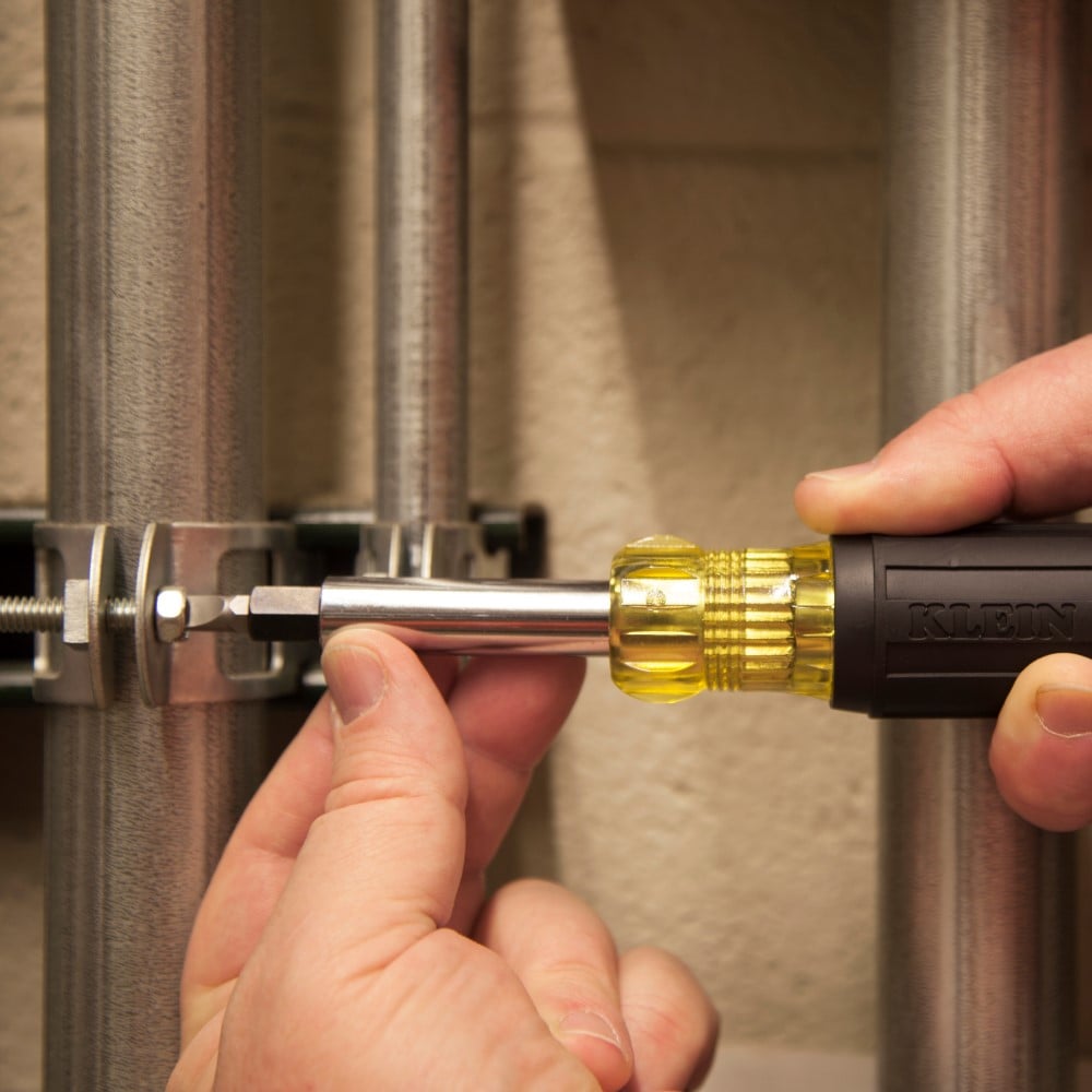 Alternate image of HEAVY-DUTY MULTI-BIT SCREWDRIVER/ NUT DRIVER in use.