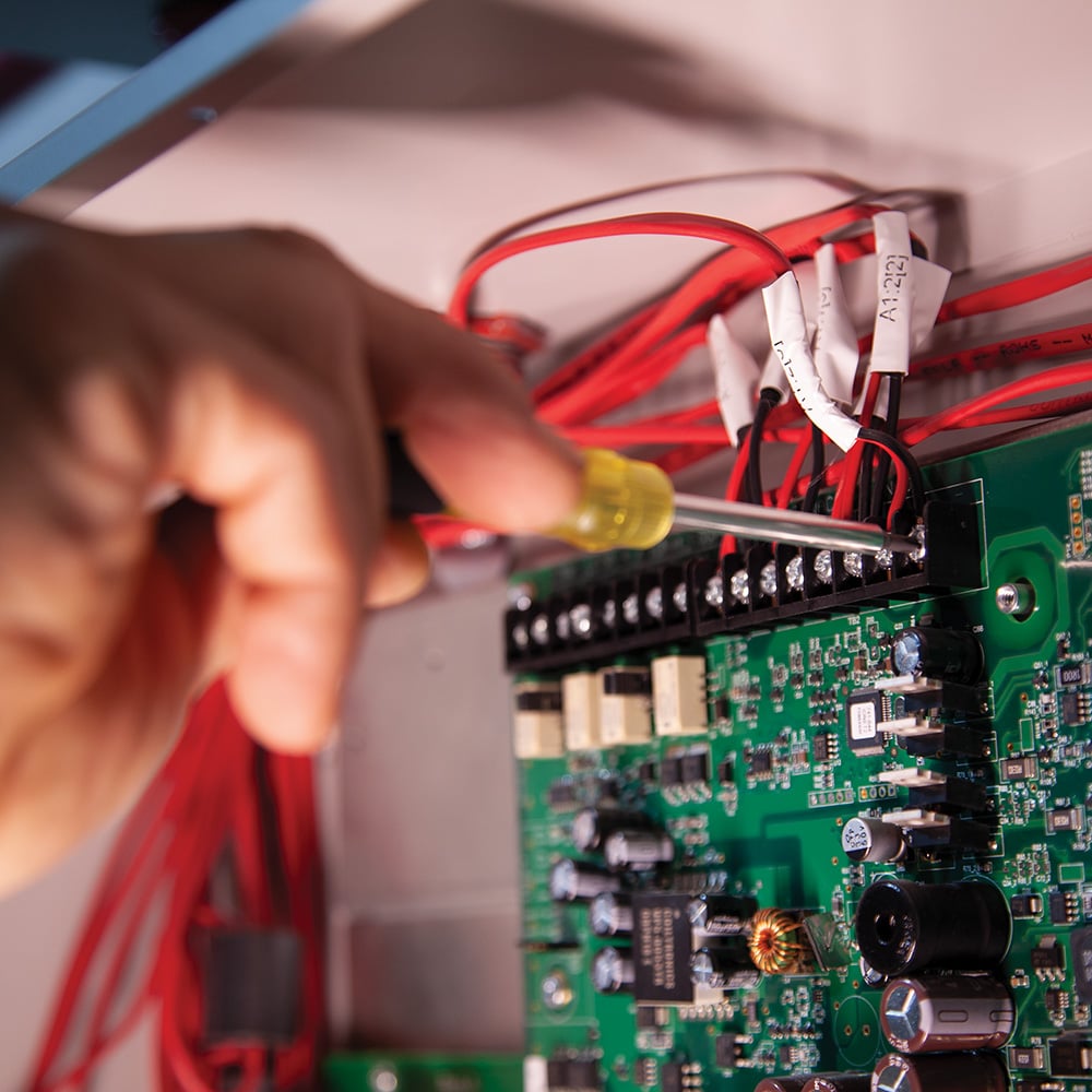 Image of ELECTRONICS POCKET SCREW DRIVER 4-IN-1 in use.