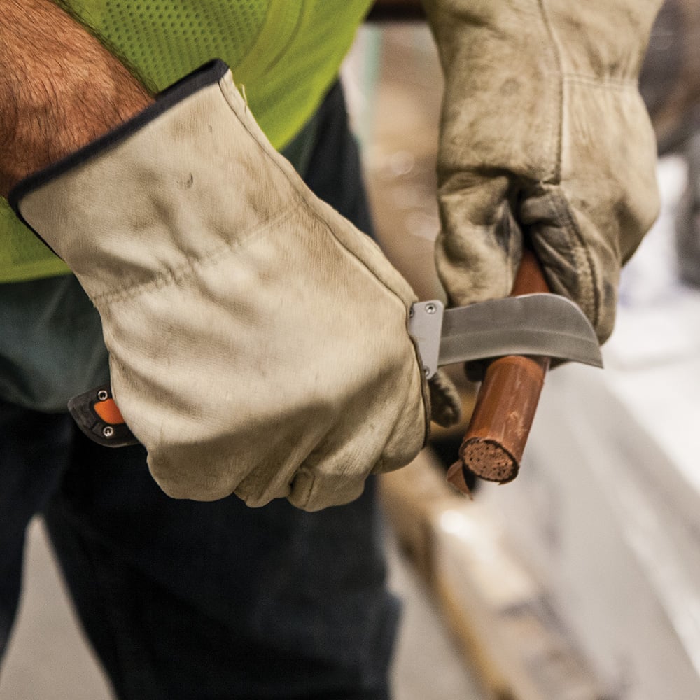 Image of CABLE SKINNING KNIFE in use.