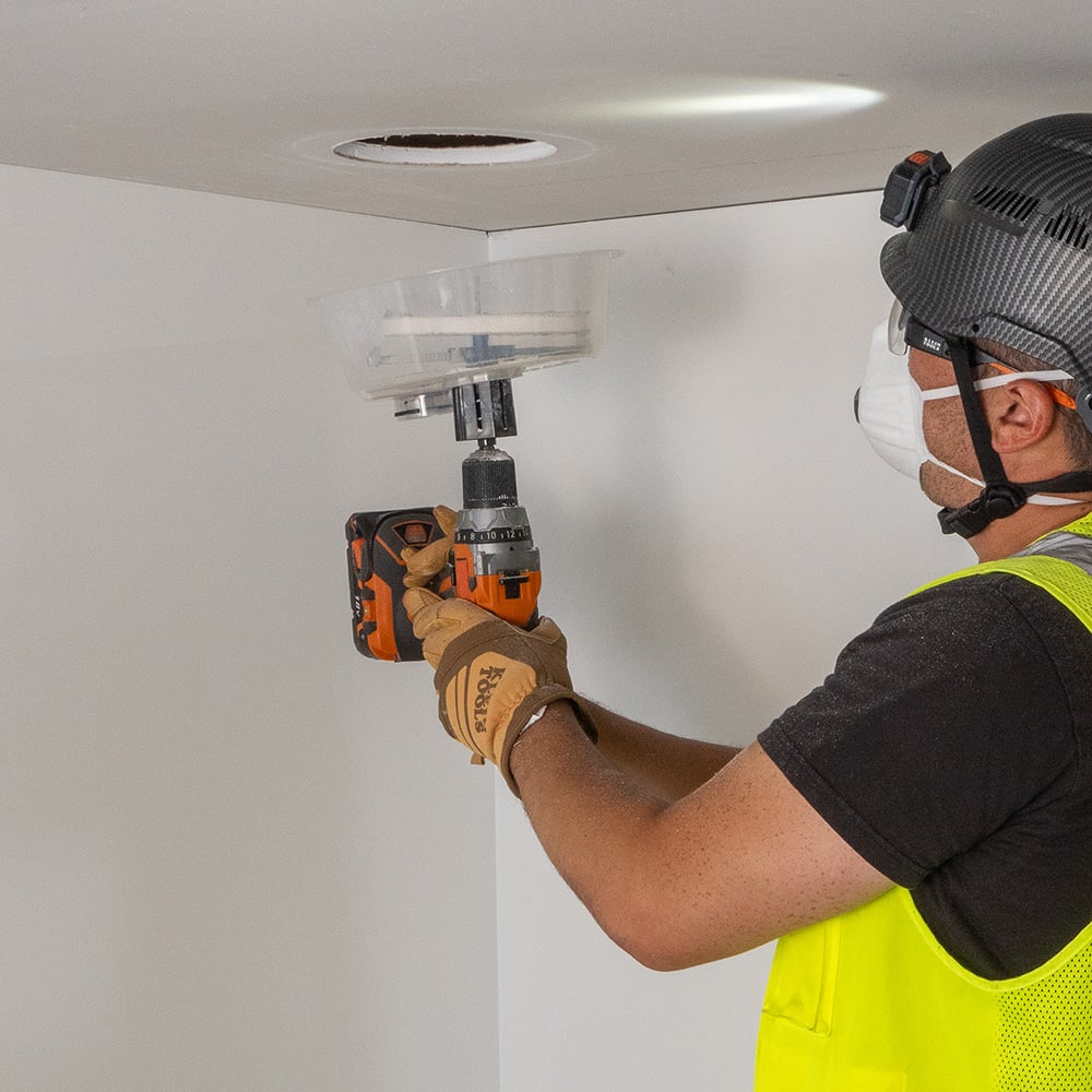 Alternate image of ADJUSTABLE HOLE SAW WITH AUTO-SET ARMS in use.