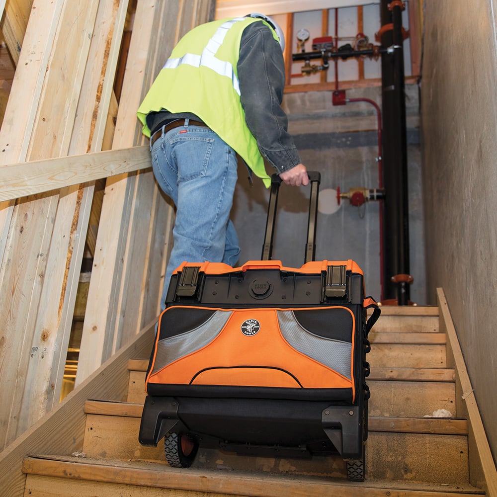Image of TRADESMAN PRO TOOL MASTE R ROLLING TOOL BAG in use.