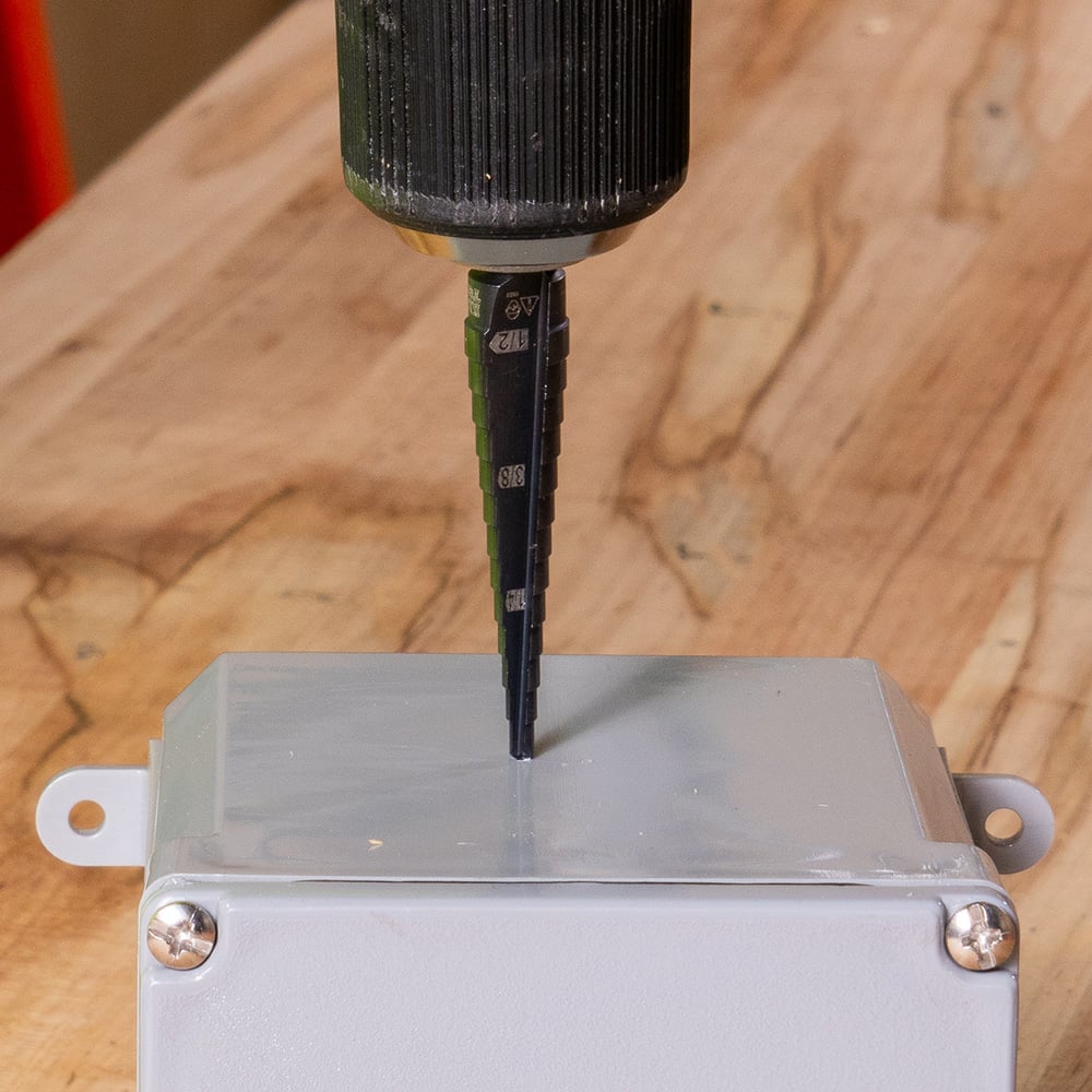 Alternate image of STEP DRILL BIT #1 - DOUB LE-FLUTED in use.