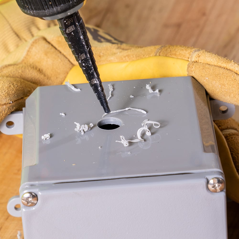 Image of STEP DRILL BIT #1 - DOUB LE-FLUTED in use.