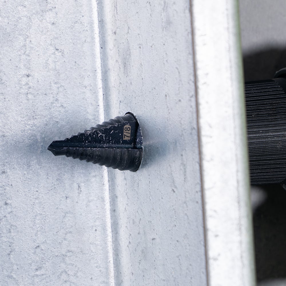 Alternate image of STEP DRILL BIT #11 - DOU BLE-FLUTED in use.
