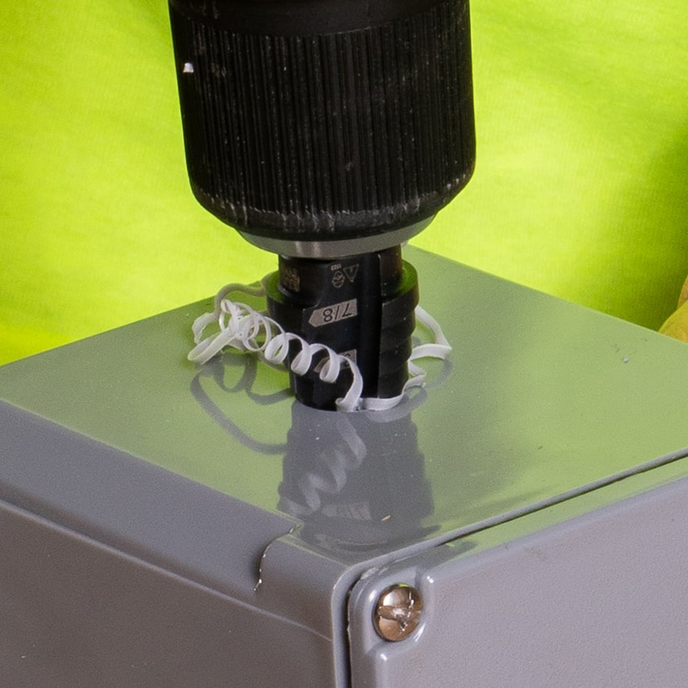Alternate image of STEP DRILL BIT #14 - DOU BLE-FLUTED in use.