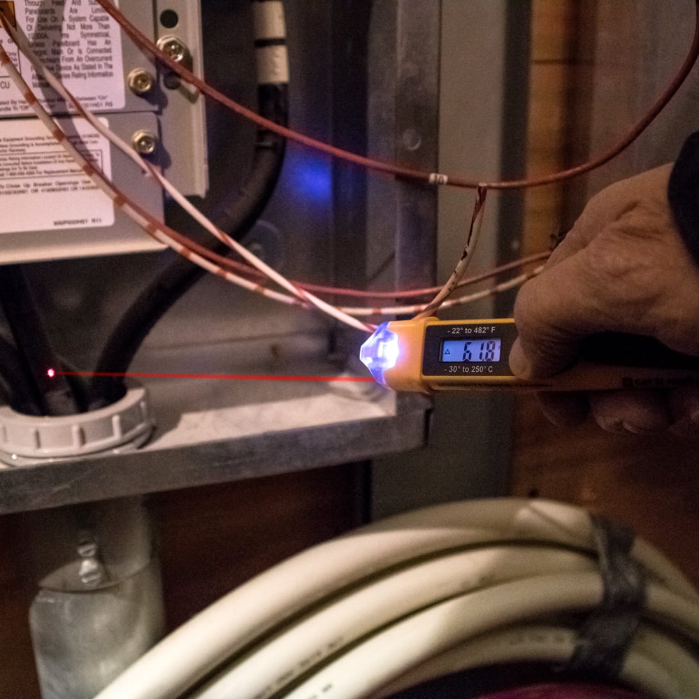 Image of NON-CONTACT VOLTAGE TEST ER W/INFRARED THERMOMETE in use.