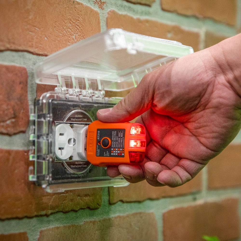 Image of GFCI RECEPTACLE TESTER in use.